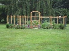 an outdoor garden area in the middle of a field