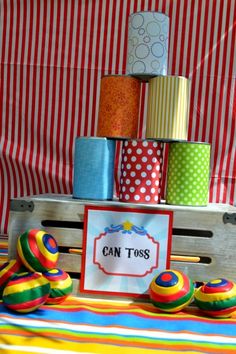 a birthday party with cupcakes and other items on the table in front of it