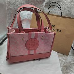 Brand: Coach Color: Pink Size: 11 1/2" (L) X 8 3/4" (H) X 5" (W) Material: Signature Jacquard And Refined Pebble Leather Inside Zip, Cell Phone And Multifunction Pockets Snap Closure, Fabric Lining Detachable Strap With 20" Drop For Shoulder Or Crossbody Wear Original Dust Bag Excellent Condition, Like New. Womens Tote Bags, Pebbled Leather, Coach Bags, 4 H, Snap Closure, Dust Bag, Cell Phone, Tote Bag, The Originals