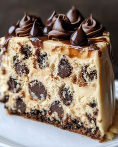 🍪 Decadent Cookie Dough Delight Cake 🍪 Ingredients: For the Cake: 2 1/2 cups all-purpose flour 1 1/2 tsp baking powder 1/2 tsp baking soda 1/4 tsp salt 1 cup unsalted butter, softened 1 1/2 cups granulated sugar 4 large eggs 1 cup milk 2 tsp vanilla extract For the Cookie Dough Filling: 1/2 cup unsalted butter, softened 1/2 cup brown sugar, packed 1/4 cup granulated sugar 2 tbsp milk 1 tsp vanilla extract 1 1/4 cups all-purpose flour 1/2 cup mini chocolate chips For the Frosting: 1 cup u... Cookie Dough Filling, Postre Keto, Bread Recipes Sweet, Delicious Snacks Recipes, Fair Food Recipes, Food Platters, Mini Chocolate Chips, Cake Ingredients, Yummy Appetizers