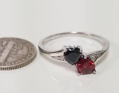 "Thanks for shopping our vintage estate store. We tend to sell well below wholesale and truly hope you enjoy all of our items. Many of the items are one of a kind, so please enjoy scrolling through the pictures and hopefully something will catch your eye. Black spots are from camera. Nice estate sterling silver 925 garnet or ruby with black cz diamond heart with by pass ring. This is a custom made ring from our shop, meaning we set the gems into the setting. Ring Size: please select a size Setti Black Jewelry For Anniversary, Black Rings For Valentine's Day Formal Occasion, Black Rings For Valentine's Day Formal Events, Black Ring For Valentine's Day Formal Occasion, Black Birthstone Rings For Anniversary, Silver Ruby Ring With Gemstone, Valentine's Day Classic Anniversary Birthstone Ring, Black Rings For Valentine's Day, Black Ruby Rings As Gift