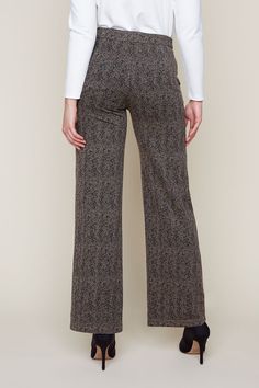 These Knit Herringbone Pants in Tan Combo are a stylish and comfortable addition to any wardrobe. Made with a trendy herringbone pattern, these pants provide a flattering fit and versatile style. The soft knit fabric offers both comfort and durability, making them a perfect choice for both work and play. Elegant Wide Leg Sweatpants For Fall, Elegant Wide-leg Sweatpants For Fall, Comfortable Full-length Workwear Bottoms, Comfortable Full-length Bottoms For Work, Comfortable Fall Ankle-length Pants, Comfortable Stretch Pants For Workwear, Fitted Jacquard Knit Bottoms, Comfortable Fall Trousers, Herringbone Pattern Trousers For Fall