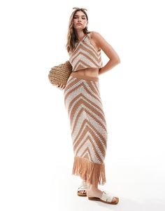 Skirt by ASOS DESIGN Part of a co-ord set Top sold separately Chevron design High rise Elastic waist Tassel hem Regular fit Summer Maxi Skirt With Tassels, Spring Beachwear Skirt With Fringe, Ashley Outfits, Crochet Beach Shorts Asos, Spain Fits, Asos Tiered Leopard Skirt, Beach-ready Boho Print Tiered Skirt, Knitted Skirt, Chevron Stitch