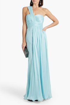 This Badgley Mischka gown features a one-shoulder silhouette and a draped, plissé georgette fabric. It is fully lined and has a concealed hook and zip fastening at the side. The fabric is non-stretchy and mid-weight. Dry clean only. Silk Formal Dress Long, Cute Dresses For Dances, Formal Dress Long, Silk Formal Dress, Georgette Gown, Prom Dress Inspiration, Blue Bridesmaids, Beach Wear Dresses, Georgette Fabric