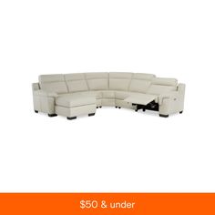 a white sectional couch sitting on top of an orange and black tablecloth with the words $ 350 & under it