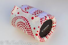 a small red and white case with polka dots on it