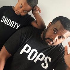 Pops Shorty©  tees are amazingly soft and perfect to match with son for football night, game day. Great Father and son bonding t-shirt set. Also an adorable girl Dad selection. HOW TO PURCHASE:  **Select each item you need from the drop down and add to cart** HOW DOES THE SHIRT FIT? * Kids Fit True to Size/Unisex * Men Fit True to Size/Unisex * Suggest women to size down/Unisex Fit MATERIAL OF SHIRT? Adult/Kids:   * 50% polyester/25% combed cotton/25% rayon  jersey * Color is Black BABY BODYSUIT Casual Tops For Game Day On Father's Day, Father's Day Team Spirit Tops With Letter Print, Family Matching Game Day Tops With Short Sleeves, Family Matching Tops With Letter Print For Game Day, Father's Day Matching Letter Print Tops, Everyday Family Matching Tops With Text Print, Short Sleeve Tops With Funny Text For Game Day, Vacation Clothing, Matching Clothing