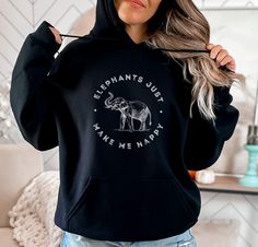 "Welcome to Pink Pepper Designs Co.! Looking for the perfect gift for that elephant lover in your life? Look no further than our \"elephants make me happy\" hoodie! This comfy and stylish shirt features a whimsical vintage elephant illustration, making you smile every time you wear it. Our elephant sweatshirt makes a great gift for anyone who loves elephants, from kids to the young at heart! Available in plus sizes too. All our adult and youth sweatshirts and hoodies are a super comfy style from Acotar Merchandise, Acotar Books, Moon Clothing, Boho Celestial, Native American Men, Workout Beginner, Trendy Hoodies, Stylish Hoodies, Trendy Items