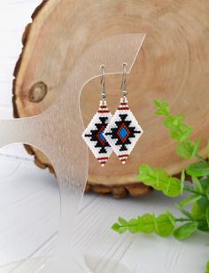 Traditional Black Beaded Earrings, Traditional Black Beaded Dangle Earrings, Traditional Dangle Earrings With Black Beads, Traditional Black Beaded Drop Earrings, Traditional Handmade Black Beaded Earrings, Handmade Black Southwestern Beaded Earrings, Handmade Southwestern Black Beaded Earrings, Southwestern Black Beaded Earrings For Gift, Beadwork Designs