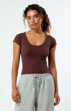 The Seamless Scoop Top from PS Basics by Pacsun offers a comfortable and flattering fit for your everyday style. This top has short sleeves, a scoop neckline, and a fitted design.Solid color topSeamless fabricGood stretchShort sleevesScoop necklineFitted67% rayon, 25% nylon, 8% spandexHand washModel is wearing a size XS PS Basics by Pacsun Womens Seamless Scoop Top - Brown size Small Cheap Seamless Scoop Neck Top, Seamless Scoop Neck Summer Top, Summer Scoop Neck Seamless Crop Top, Seamless Fitted Scoop Neck T-shirt, Pacsun Tops Tees, Scoop Top, Pacsun Tops, Pacsun, Everyday Style