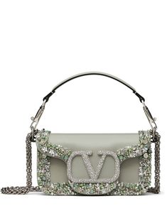 grey nappa leather silver-tone hardware crystal-embellished VLogo Signature crystal embellishment bead embellishment foldover top with magnetic fastening detachable chain-link shoulder strap single detachable top handle internal slip pocket main compartment Valentino Bag, Valentino Garavani Bag, Miu Miu Shoes, Iconic Bags, Valentino Bags, Leather Silver, Demi Fine Jewelry, Fine Earrings, Ballet Flat Shoes