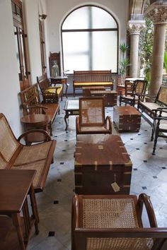 a room filled with lots of wooden furniture