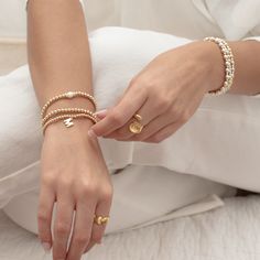 as a best-selling signature piece from our Dreamer Series, we are introducing all-new beaded bracelet styles. these have rapidly become an acclaimed favorite for a reason. our material upgrades to 14k US gold filled + sterling silver ensure that this bracelet will endure daily wear. worn solo or added to your arm candy; in all cases, remember to Dream On. demi-fine 14k US gold filled 3mm beads 18k gold triple plated over brass charm 6.5", stretchy sold individually shop all Beaded Bracelets Elegant Jewelry With Letter Beads For Everyday, Adjustable Yellow Gold Stackable Beaded Bracelets, Stackable Adjustable Yellow Gold Beaded Bracelets, Adjustable Stackable Yellow Gold Beaded Bracelets, Adjustable 14k Gold Filled Bracelets For Layering, Adjustable 14k Gold-filled Bracelets For Layering, Adjustable Stackable Rondelle Bracelets, Dainty Hypoallergenic Stretch Bracelet For Everyday, Everyday 14k Gold Filled Hand-strung Bracelets