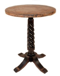 an old fashioned wooden table with spiral legs