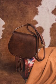 #originaldesign Lavawa Vintage Tassel Crossbody Saddle Bag Crossbody Saddle Bag, Best Shoes, Leather Saddle Bags, Saddle Bag, Unique Designers, Nice Shoes, Saddle Bags, Saddle, Sunglasses Case