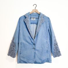 Peep This Truly Spectacular Vintage Gem Of A Denim Jacket. Literally Incredible. Fashioned By El Paso, Tx Legend, Lorraine Wardy, For Her Opal Line And Made In The Usa, This Beauty Is Packed With Vintage Charm. Soft Denim Jacket Material Takes An Oversized Blazer Shape And Slays With Crochet/Macrame Detailing On The Sleeves And Collar. She’s Truly Multifaceted And Is Sized As An Xs For A Super Slouchy Oversized Fit. This Jacket Could Definitely Fit Up To A Medium For A More Relaxed Look, But Could Still Fit A Large If You Like It More Fitted. Please See Measurements For Fit! Brand Name: Opal By Lorraine Wardy Market: Women’s, Vintage, Jackets, Shackets, Blazers Color: Blue, Denim Materi Vintage Oversized Outerwear For Spring, Retro Denim Outerwear For Spring, Spring Medium Wash Cotton Blazer, Vintage Oversized Outerwear For Summer, Spring Cotton Blazer In Medium Wash, Casual Medium Wash Blazer For Spring, Casual Spring Blazer, Vintage Denim Jacket For Spring, Vintage Long Sleeve Denim Jacket For Spring