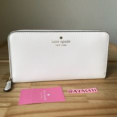 100% Authentic Kate Spade K4697 Brynn Large Continental Wallet Parchment And Gold Hardware **Brand New With Tags** 8” L X 4” H Classic White Wallets For Daily Use, Classic White Wallets For Everyday Use, Classic Everyday White Wallets, White Kate Spade Wallet For Everyday Use, Kate Spade White Leather Wallet, Classic White Wallet For Travel, White Kate Spade Bags With Card Slots, White Rectangular Kate Spade Wallet, Everyday White Bifold Wallet