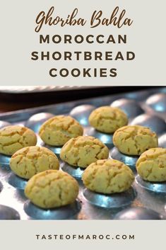 several cookies sitting on top of a cookie sheet with the words, chocolate bacala moroccan shortbread cookies