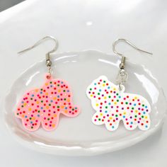 These earrings are made with stainless steel ear wires and lightweight acrylic.  The charms are 1 1/8 inches in size. If you order two or more items use the promo code twocool to get $2 off your order! Free Standard Shipping! Cookie Earrings, Animal Cookie, Animal Cookies, Colorful Earrings, Cute Jewelry, Ear Wires, Cookies Et Biscuits, Halloween Shopping, Jewelry Earrings Dangle