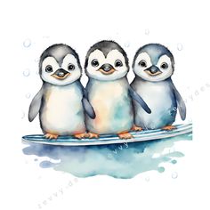 three little penguins sitting on top of a surfboard