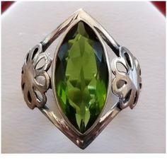 Gorgeous! Bright Green With Perfect Sparkles! A Very Lovely Ring With Lots Of Sparkle And Color!!! Set In 925 Stamped Sterling Silver. Please See All Pictures For More Detail And Measurementsml. Brand New. Never Worn. Wholesale Prices Always....Or Less Classic Peridot Jewelry, Green Marquise Sterling Silver Jewelry, Elegant Peridot Jewelry Stamped 925, Elegant Stamped 925 Peridot Jewelry, Green Sterling Silver Gemstones For Formal Occasions, Green Marquise Hallmarked Jewelry, Hallmarked Green Gemstones, Peridot Ring, Lovely Ring