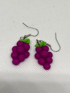 purple grapes earrings with green leaves on them