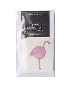 a pink flamingo temporary tattoo on top of a white package with the words temporary tattoos