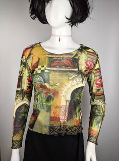 "Very nice vintage 90s mesh top long sleeve tattoo abstract Sophie Adde pattern from Adventures Des Toiles. Cool for rave and everyday look. Size 38 tag, fits S-L best (see measurements ) Condition 10/10 Underarm to underarm - 42 cm/16.5\" (the mesh stretches) Length from the back - 51 cm/20\" (the mesh stretches) Sleeve length - 64 cm/25\" (the mesh stretches) All measurements taken with garment lying flat. Vintage sizes vary greatly! We recommend comparing measurements with a similar style gar 90s Mesh Top, Long Sleeve Tattoo, Mesh Top Long Sleeve, Tattoo Abstract, Creative Fashion Photography, Mesh Long Sleeve Top, Mesh Tops, Y2k Clothing, Mesh Sleeves