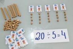 a table topped with lots of wooden blocks and numbers