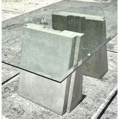 two concrete blocks sitting on top of each other