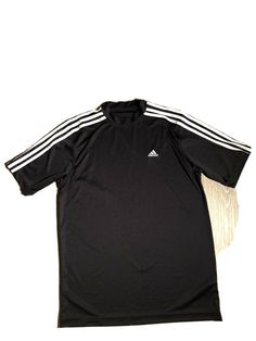 Adidas mens black eith ehite stripes athletic shirt size Medium. Condition is "Pre-owned". Shipped with USPS First Class. Adidas Sporty T-shirt With Contrast Stripes, Sportswear T-shirt With Three Stripes For Workout, Adidas Three Stripes Workout T-shirt, Adidas Contrast Stripes Crew Neck T-shirt, Adidas Crew Neck T-shirt With Contrast Stripes, Sporty Workout T-shirt With Three Stripes, Sporty Black T-shirt With Contrast Stripes, Short Sleeve Sportswear Top With Side Stripes, Adidas Three Stripes Tops For Gym