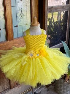 "Welcome to Baby/Infants Clothing by Funkids&Us Boutique This beautiful handmade Princess-inspired tutu dress is perfect for birthday parties or any occasion. This dress is absolutely beautiful and every little Girl love to wear it. It is made of yellow and glitter yellow soft Premium tulle, tulle skirt adds some glitter tulle.  The skirt is double layered of tulle strands. Crochet tutu top is soft and stretchable design with fabric flowers.  MADE TO ORDER - KNEE LENGTH TUTU DRESS  AVAILABLE COL Yellow Short Dress, Short Tutu, Tutu Top, Short Yellow Dress, Crochet Tutu, Princess Tutu Dress, Yellow Soft, Princess Tutu, Princess Inspired