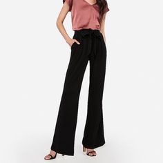 Original Retail Price: $79.90 Smooth And Sophisticated, These High Waisted Pants Are Perfect For The Office Thanks To A Paperbag Waist, Sleek Fabric And A Roomy Wide Leg. We Love Them Paired With A Portofino And Heels. Product Details - Size: Women’s Xs - Color: “Pitch Black” - Ultra Comfortable Fit - Wide Leg Style For Long Legs - Paperbag Style - High Rise - Elastic Waistband Makes Tucking In Any Top Easy! - New With Tags! - Inseam: ~32” **Check Out My Page For More Great Express Finds! ***Alw Chic Wide Leg Pants For Date Night, Elegant Wide Leg Pants For Summer Date Night, Elegant Summer Wide Leg Pants For Date Night, Chic Wide Leg Pants For Spring Evenings, Trendy High Waist Wide Leg Evening Pants, Chic Wide Leg Pants For Evening, Elegant High-waisted Pants For Date Night, Evening High Waist Wide Leg Pants With Pockets, Elegant Bottoms With Pockets For Evening