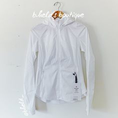 Description: Lululemon Goal Smasher Jacket In White (Wht). Pristine True White Color. Og Old Style From 2022. Special Collector’s Item. Designed For Running. Lightweight. Stretch Panels. Plenty Of Pockets. Secure Front Pockets. Zippered Back Pocket With Hidden Phone Sleeve. Back Vent. Pleated Back Panel. Reflective Details. Stowable, Adjustable Hood. Sateen Fabric Is Wind-Resistant. Water Repellent. 2two-Way Stretch. Thumbholes. Slim Fit, Bum-Covering Length. Sold Out. Size: Size 6 ~23" Length ( White Functional Winter Activewear, White Long Sleeve Activewear For Outdoor Activities, White Long Sleeve Outerwear For Workout, Functional White Windbreaker For Workout, White Winter Activewear For Outdoor Activities, White Long Sleeve Windbreaker For Workout, White Athleisure Outerwear For Outdoor Activities, White Activewear For Outdoor Activities In Spring, White Activewear For Spring Outdoor Activities