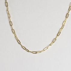 A simple, yet classic look. 2.5mm Available in lengths 6"-24" Gold-plated Paperclip Chain Necklace, Elegant Gold-tone Paperclip Necklace, Gold-tone 14k Gold Necklace With Paperclip Chain, 14k Gold-filled Necklace With Adjustable Paperclip Chain, 14k Gold-tone Paperclip Chain Necklace, Classic Looks, Gold Filled, Chain Necklace, Jewelry Collection