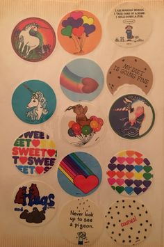 a bunch of stickers that are on a wall