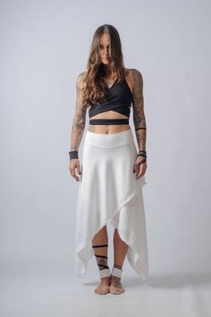 NEW asymmetric wide leg pants and skirt/Cotton High waisted plus size skirt/Edgy ankle length loose pants/Cyberpunk, palazzo pants My absolute fav design this year ! High waisted skirt made of cotton to have a perfect fit and flowy feeling ! Two pieces wrapped together create asymmetrical design ,hem touching the ankle and the highlight of course of the design ...the ankle cuffs that are attached to the skirt with buttons and transform the skirt into pants ! You can remove them and use them on o Chic White High-low Hem Bottoms, Edgy Asymmetrical Summer Skirt, Versatile Asymmetrical Maxi Skirt For Summer, Versatile Asymmetrical Summer Maxi Skirt, Versatile Fitted Harem Pants For Summer, Edgy Asymmetrical Skirt For Summer, Edgy Relaxed Summer Skirt, Casual White High-low Hem Bottoms, Asymmetrical White Bottoms For Summer