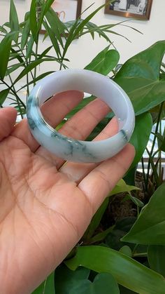 Genuine Burmese Ice Blue-green Jadeite Jade Bangle Bracelet. This bangle is made with very high-end genuine Burmese blue green jadeite jade. The jade texture is so transparent with blue-green-purple. The blue-green color and lavender color with the smooth texture, are truly a mesmerizing combination. The Classic half-round wider style bracelet. it looks very luxurious and perfect high-end gift for yourself or your love. It's a collectible item. Luxury Jade Bangle Bracelet, Luxury Jade Bangle Jewelry, Luxury Green Jade Jewelry, Luxury Green Jade Bangle, Luxury Blue Jade Jewelry, Jade Bangle Bracelet, Jade Bangle, Lavender Color, Burmese