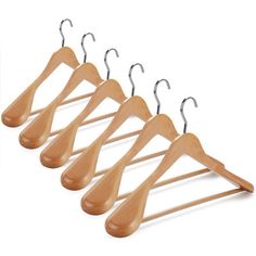 four wooden clothes hangers with metal clips on each side and one hanging in the middle