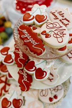 some cookies that are sitting on top of a plate and in the shape of hearts