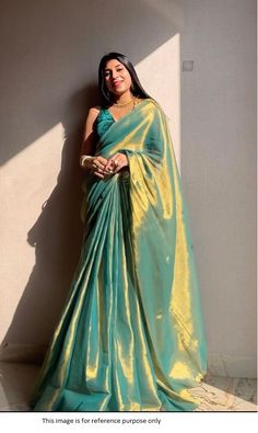 Bollywood Replica SareeBollywood Model Golden Pastel green tissue silk wedding sareeSaree fabric : In Heavy pure base double shade golden pastal green color glass tissue silk Blouse:Velvet material 0.80Mrts unstitched .Buy this Saree at Kollybollyethnics and make your occasion very special !!. With Express Free Shipping and Custom Stitching, Shop Bollywood Model Golden Pastel green tissue silk wedding saree at kollybollyethnics from India with free worldwide shipping. Green Blouse Piece With Sheer Dupatta For Festive Occasions, Green Pre-draped Saree With Dupatta, Green Tussar Silk Pre-draped Saree With Dupatta, Green Anarkali Blouse Piece In Tissue Silk, Green Tussar Silk Pre-draped Saree, Green Tissue Silk Pre-draped Saree For Festive Occasions, Festive Green Chanderi Pre-draped Saree, Festive Green Tissue Silk Pre-draped Saree, Green Raw Silk Traditional Wear With Sheer Dupatta