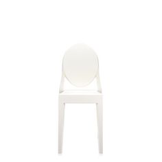 a white plastic chair with an oval back and seat cushion on the front, viewed from the side