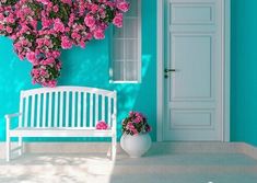 a white bench in front of a blue wall with pink flowers on it and the words magic puzzles