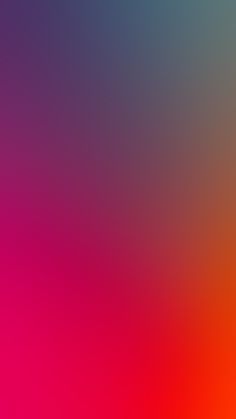 a blurry image of an orange and pink background