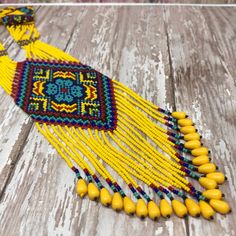 Western Seed Beads Necklace Yellow And Multi Color 31" Long Necklace Festival Long Beaded Necklaces With Large Beads, Colorful Beads Long Necklace For Festival, Traditional Yellow Beaded Necklaces For Festivals, Traditional Yellow Beaded Festival Necklaces, Adjustable Yellow Necklace With Dangling Beads, Festival Long Necklace With Colorful Round Beads, Long Necklace With Faceted Beads For Festivals, Yellow Artisan Beaded Necklaces For Festivals, Artisan Yellow Beaded Festival Necklaces