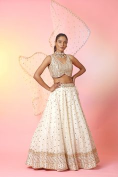 Buy beautiful cream mirror work lehenga online in USA with dupatta. Look your best at weddings and parties in Indian dresses, designer lehengas, Anarkali suits, designer gowns, salwar suits, sharara suits, embroidered sarees, designer sarees from Pure Elegance Indian fashion store in USA.-front Cream Traditional Wear With Mirror Work, Festival Cream Dupatta With Mirror Work, Cream Lehenga With Mirror Work In Georgette, Traditional Cream Lehenga With Mirror Work, Semi-stitched Cream Lehenga With Mirror Work, Cream Mirror, Suits Sharara, Lehenga With Dupatta, Anarkali Suits Designer