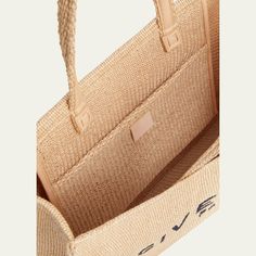 Givenchy "G-Tote" shopper bag in raffia-like cotton  Top handles  Open top  Interior, one slip pocket  Approx. 12.2"H x 17.3"W x 5.9"D Made in Italy Luxury Everyday Straw Tote Bag, Luxury Straw Tote Bag For Everyday, Luxury Straw Tote Bag With Rolled Handles, Luxury Straw Tote Bag, Luxury Beige Tote Beach Bag, Modern Straw Bag With Handles For Shopping, Modern Straw Shopping Bag With Handles, Top Handle Straw Bag With Dust Bag For Shopping, Luxury Rectangular Straw Bag With Rolled Handles