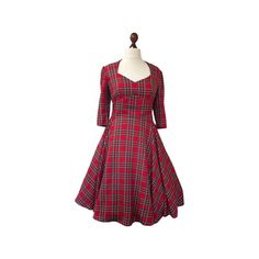 Beautiful 1950's inspired  tartan dress. Expertly made and finished to a high standard.  Diamond neckline, fitted midriff with 3/4 length sleeves and a full circle skirt! Lined bodice with a back zipper fastening. Made from stunning quality poly/viscose mix medium weight tartan fabric in Royal Stewart red or Black Watch emerald.  Length is 25" from waist. Message for an alternative length or fabric option.                UK sizes & measurements     Bust-Waist- size 6 ~   31-24-33" size8  ~    32 Fitted Knee-length Retro Plaid Dress, Fitted Retro Knee-length Plaid Dress, Retro Fitted Knee-length Plaid Dress, Fitted Plaid Retro Vintage Dress, Fitted Retro Plaid Vintage Dress, Retro Plaid Fitted Vintage Dress, Fitted A-line Plaid Dress For Fall, Plaid Fitted Knee-length Midi Dress, Fitted Midi Length Plaid Dress