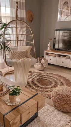 a living room filled with lots of furniture and decor on top of carpeted flooring