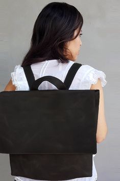 Our Backpack has a timeless design with simple lines that will complete your casual stylish look! A great choice as a Work Bag or as a School Bag Or even as a Diaper Bag. *Available in Smaller size. The bag has one large compartment, a zipper closure and an inside open pocket.  #Black #BlackBag #Leather #Backpack #BlackLeatherBackpack #LeatherBag #LeatherBackpack #LeatherCraft #LeatherGift #MinimalistBag #MinimalistDesign #SpecialGift #Handmade #Handcrafted #HandmadeBag #Women'sBag #GiftsIdeas Everyday Standard Backpack With Waxed Finish, Modern Everyday Backpack With Waxed Finish, Waxed Finish Satchel Backpack For Everyday, Everyday Waxed Satchel Backpack, Rectangular Waxed Finish Backpack For On-the-go, Modern Standard Backpack With Waxed Finish, Everyday Waxed Finish Satchel Backpack, Modern Waxed Finish Standard Backpack, Leather Tote Bag For Commuting